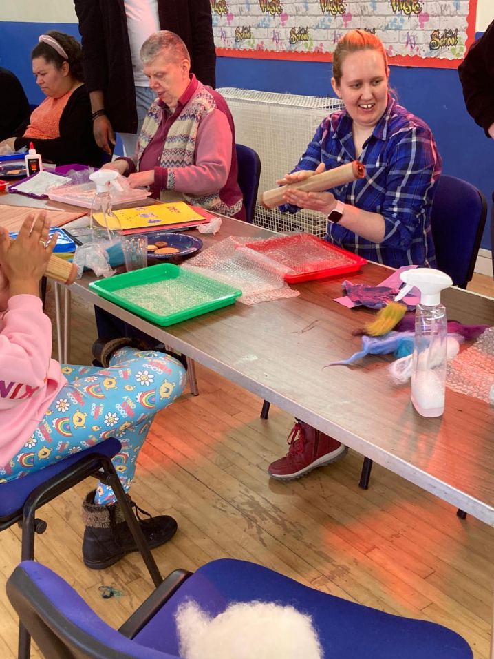 Participants working on bubble wrap printing art